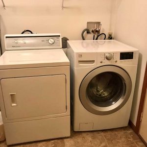 Full sized laundry with washer and dryer